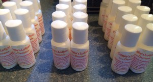 Getting samples of Cassie's lotion ready for the Rebels & Readers Author event in Huntington WV on Nov. 8, 2014. Part of my author "swag".